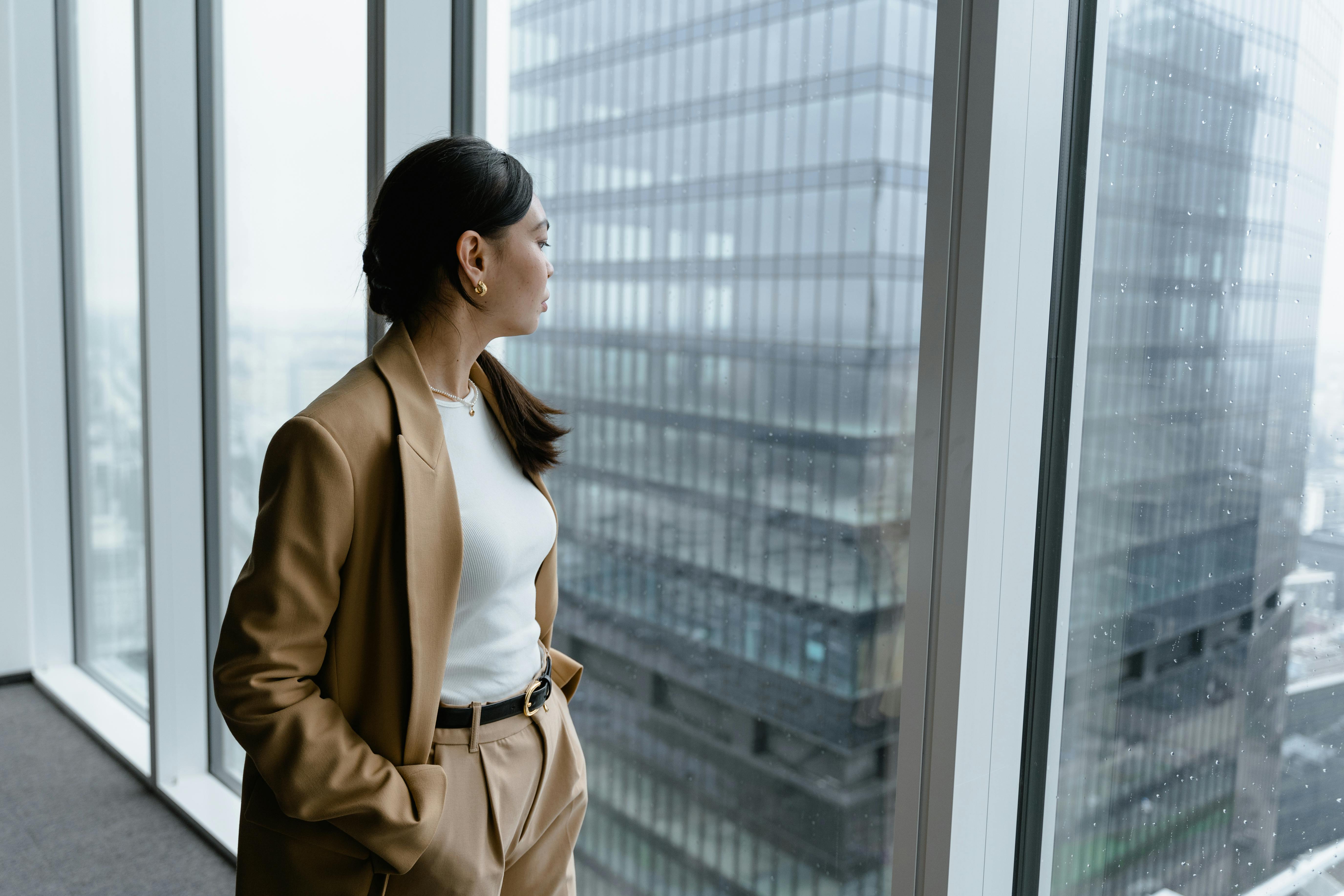 woman looking out window